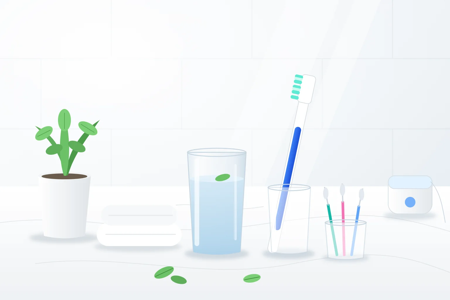 Soft-bristled toothbrush, interdental brushes, dental floss, and a glass of water on a bright bathroom counter for gentle gum care
